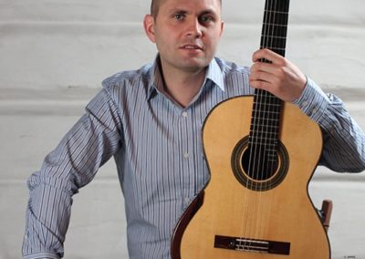 Paweł Kwaśny - musician, guitar player, manager, pedagogue